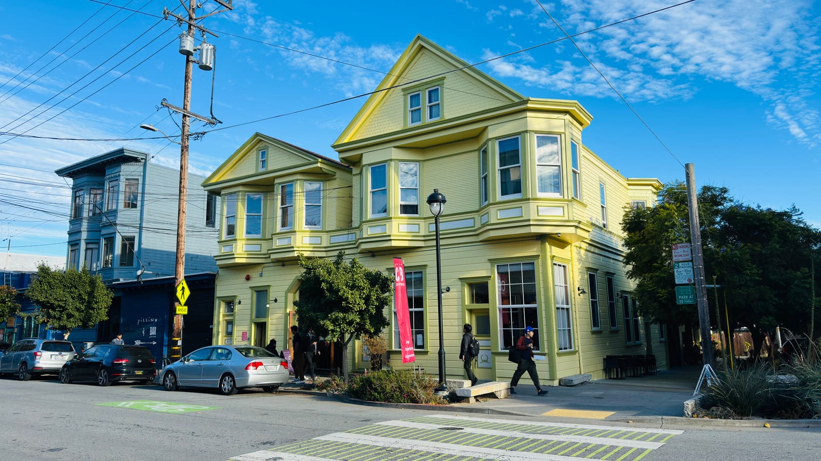 A restored corner Victorian in San Francisco's Dogpatch, with the neighborhood's mix of period houses and newer construction behind.